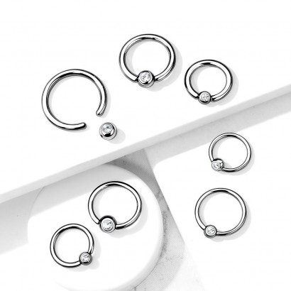 Piercing - kruh titan se zirkonem (1,0 x 10 x 3 mm)